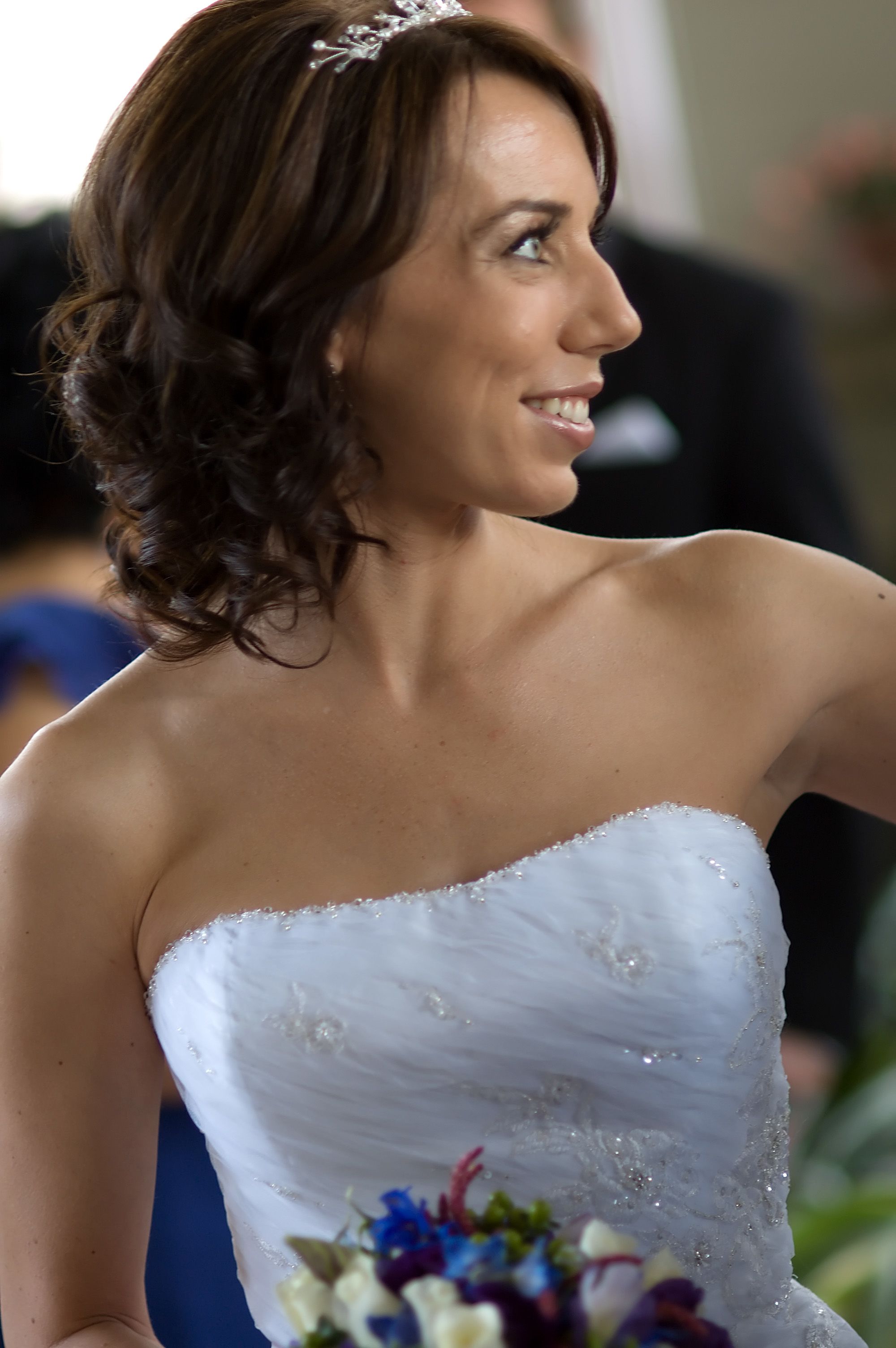 woman holding white and pink rose flower bouquet